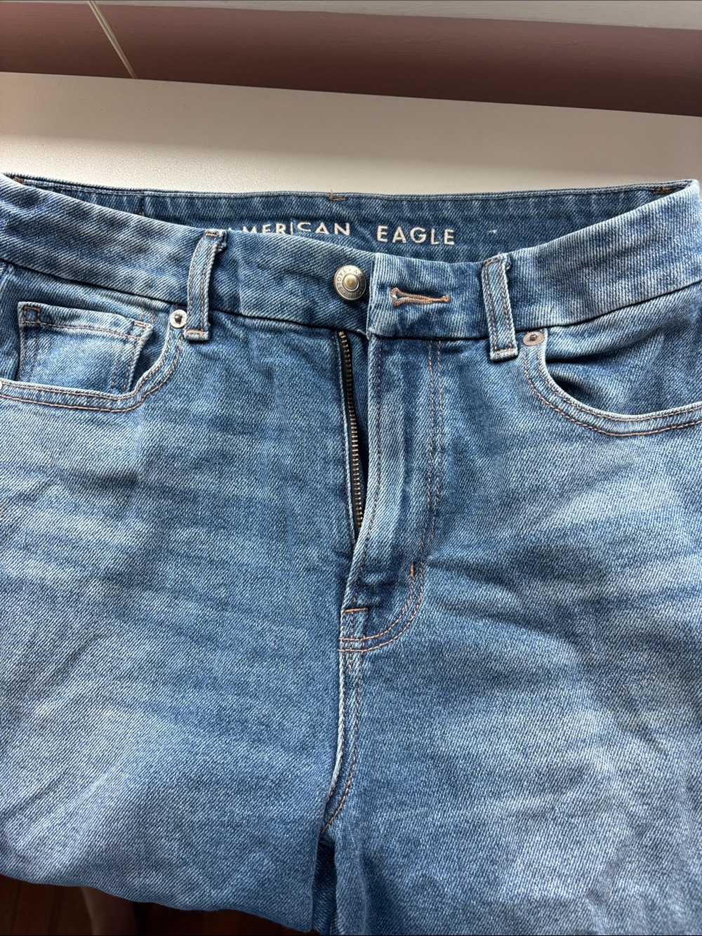 Blue Curvy Mom Jeans from American Eagle with no Rips